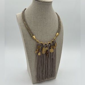 Stella and Dot grey and gold tassel necklace